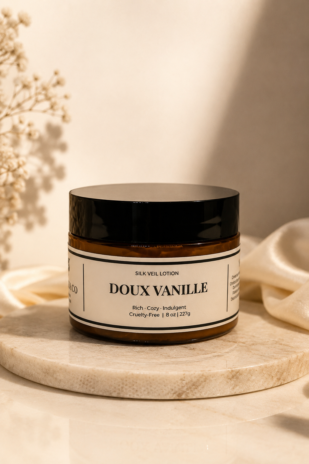 Jar of Doux Vanille lotion on a marble surface with a neutral background
