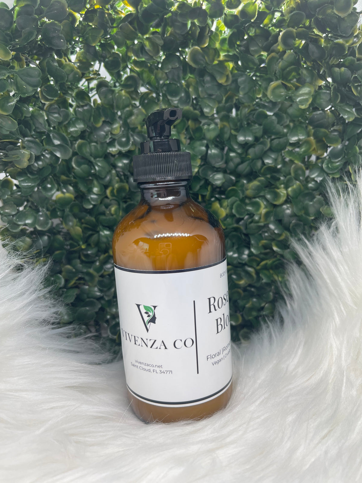 Bottle of VIVENZA Co. product on a textured green and white surface